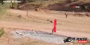 duyarli-cocuk-yere-dusen-bayragi-almak-icin-piste-kostu-tlme.jpg