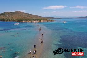 turkiyenin-en-muhtesem-yuruyus-rotasi-deniz-cekiliyor-yol-ortaya-cikiyor-evtv.jpg